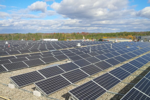 Solar panels on manufacturing plant roof top